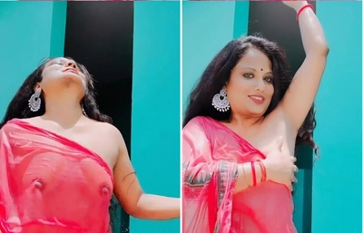 Hot Bhabi Showing Boobs Through Wet Saree